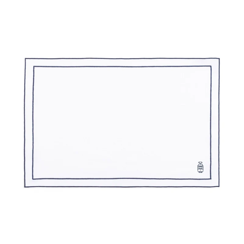 Roupa de mesa Nazaré branca, em algodão, com motivos inspirados em Portugal bordados