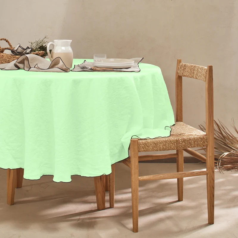 Mantel redondo con bourdon de lino lavado verde menta