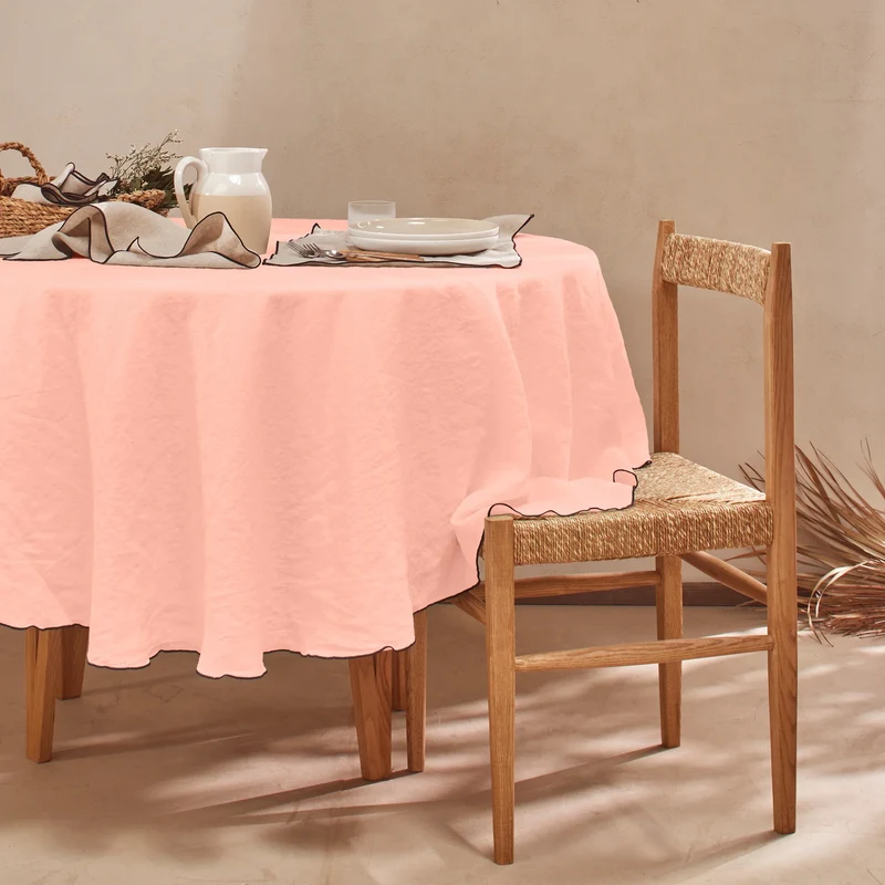 Mantel redondo con bourdon de lino lavado rosa