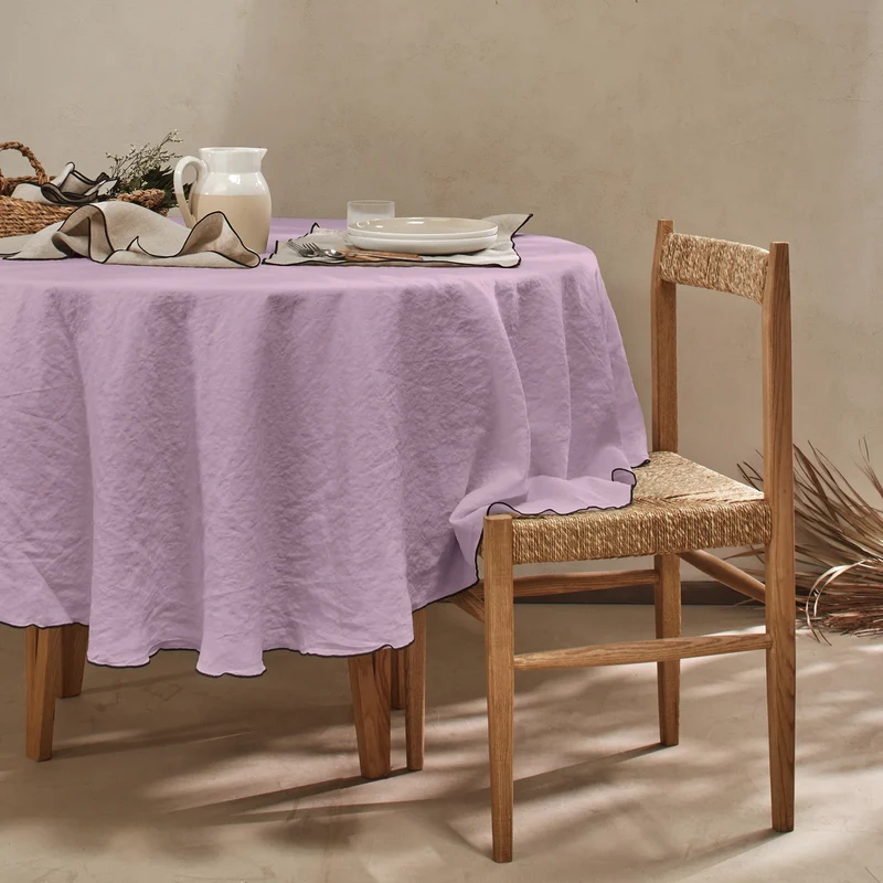 Mantel redondo con bourdon de lino lavado lila