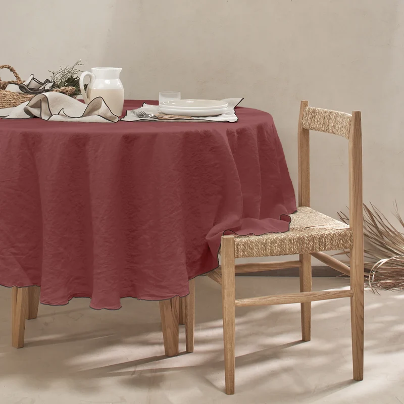 Mantel redondo con bourdon de lino lavado ladrillo