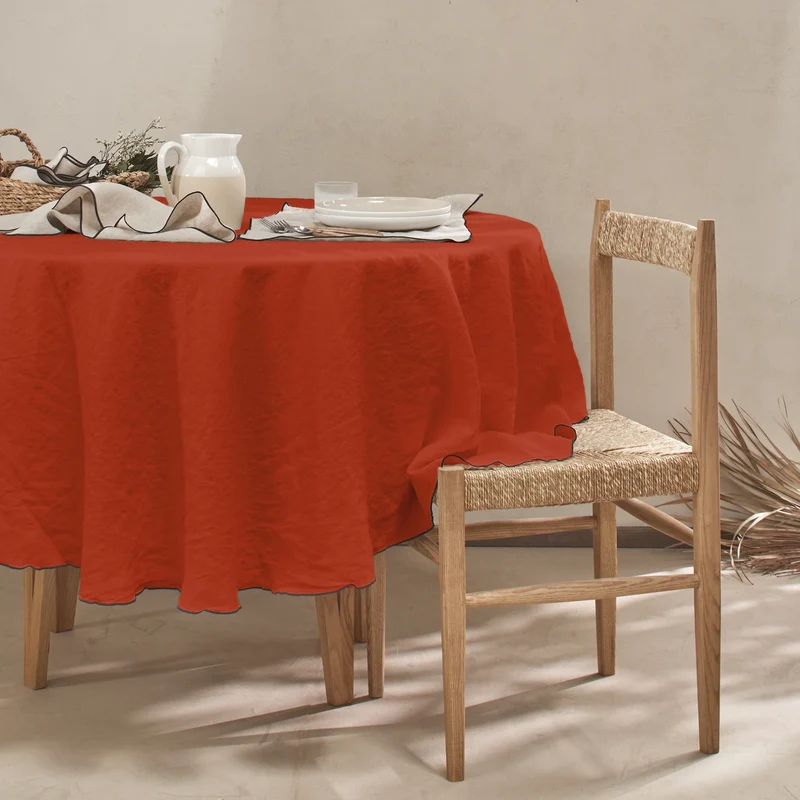 Mantel redondo con bourdon de lino lavado coral