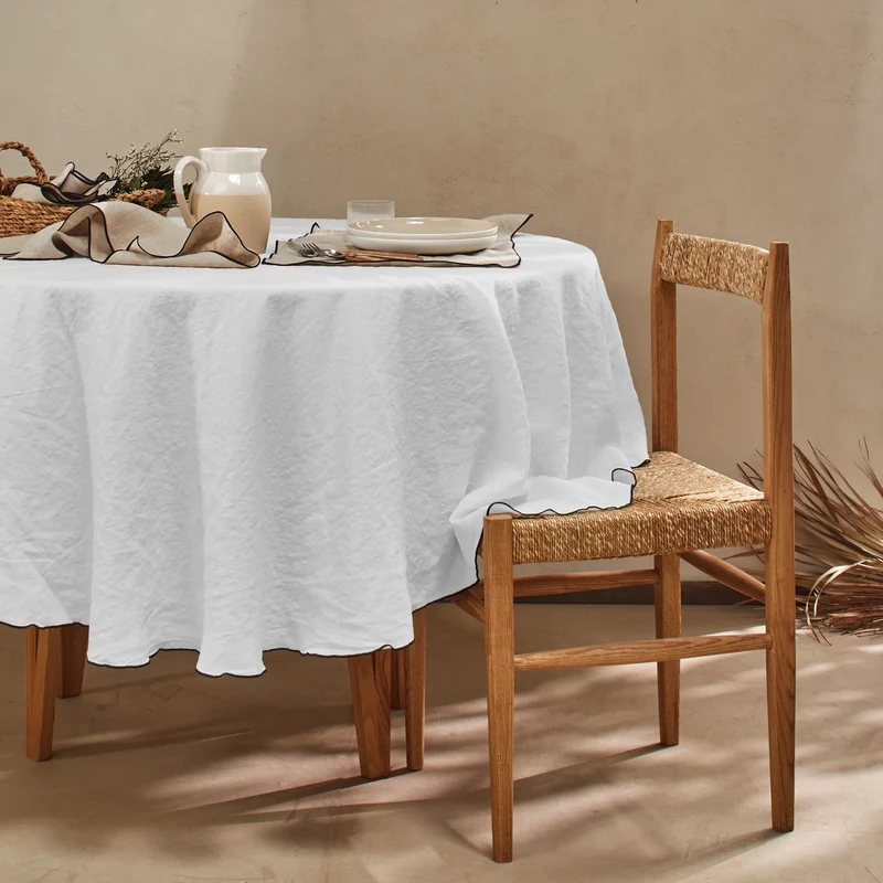 Mantel redondo con bourdon de lino lavado gris mineral