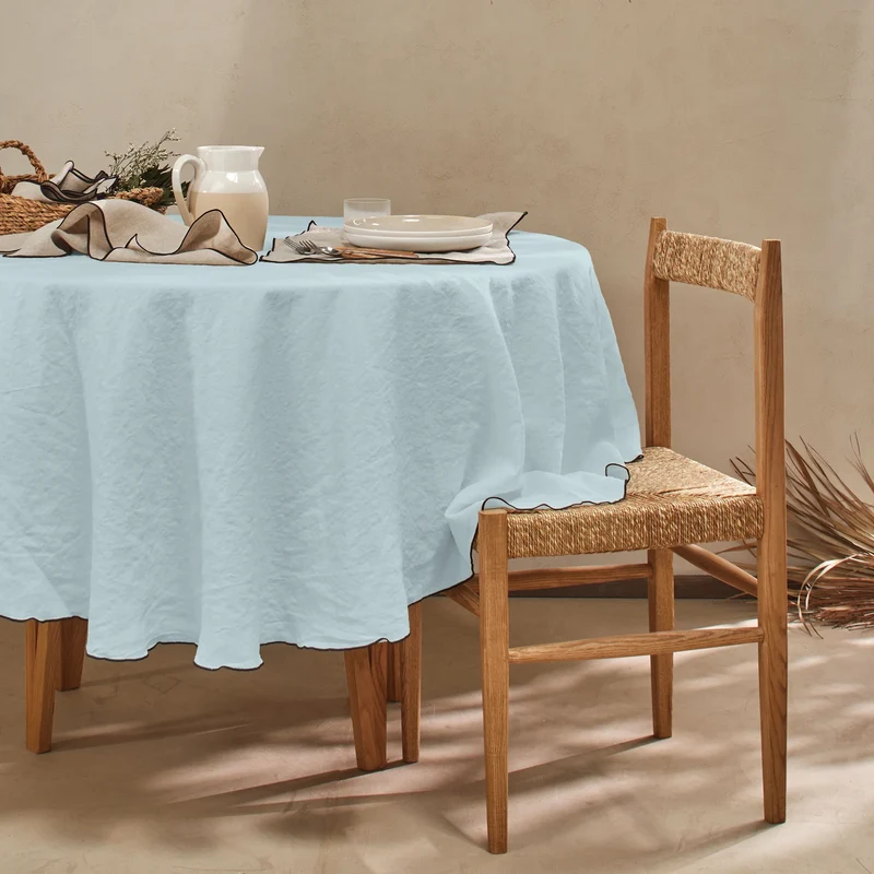 Mantel redondo con bourdon de lino lavado azul glaciar