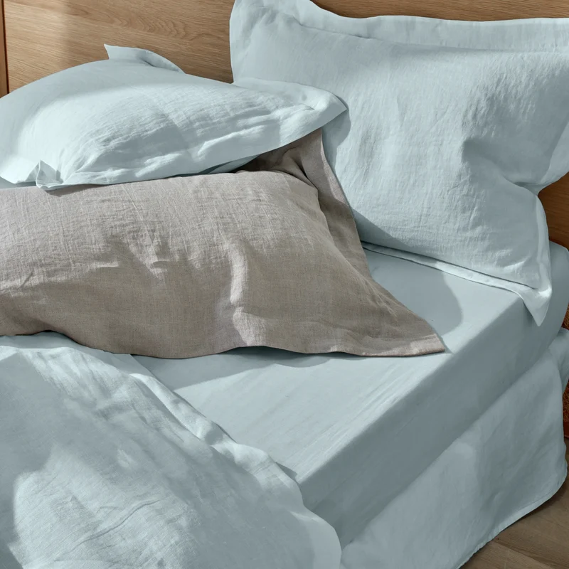 Par de fundas de almohada con volantes planos de lino azul glaciar