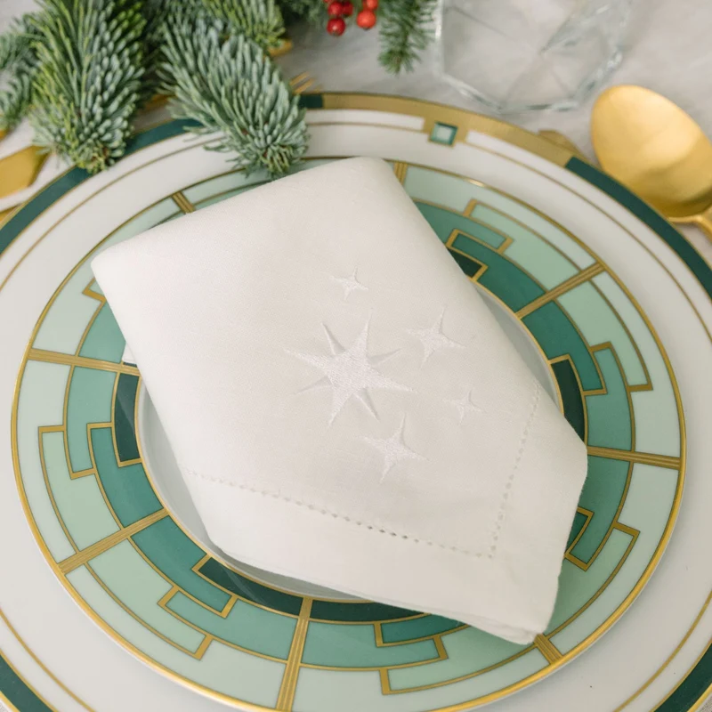 Roupa de mesa Mafra, em linho, com estrelas bordadas