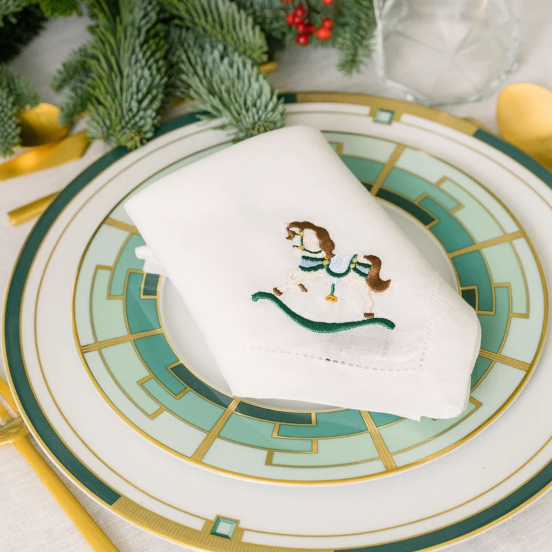Roupa de mesa Mafra, em linho, com baloiços de cavalo bordados