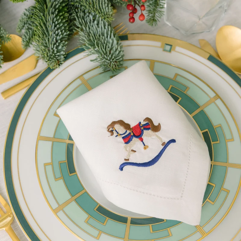 Roupa de mesa Mafra, em algodão, com baloiços de cavalo bordados