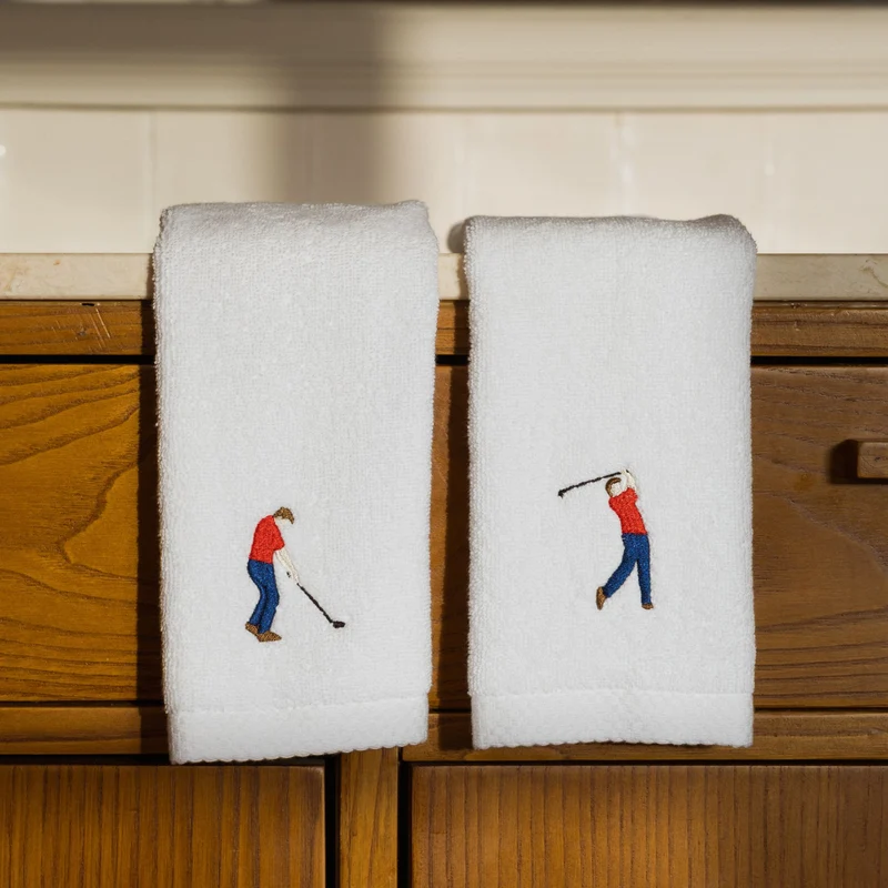 Toalhas de banho Luxus brancas, em algodão, com desportistas retro bordados
