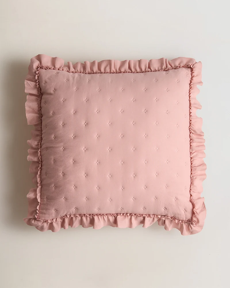 Cojín perforado rosa keike