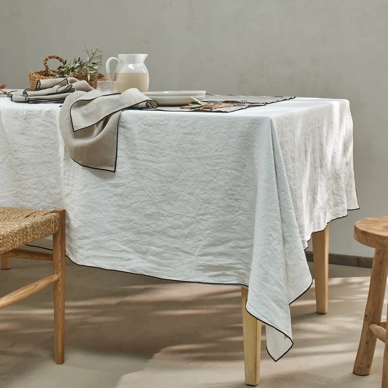 Mantel rectangular con bourdon de lino lavado marfil