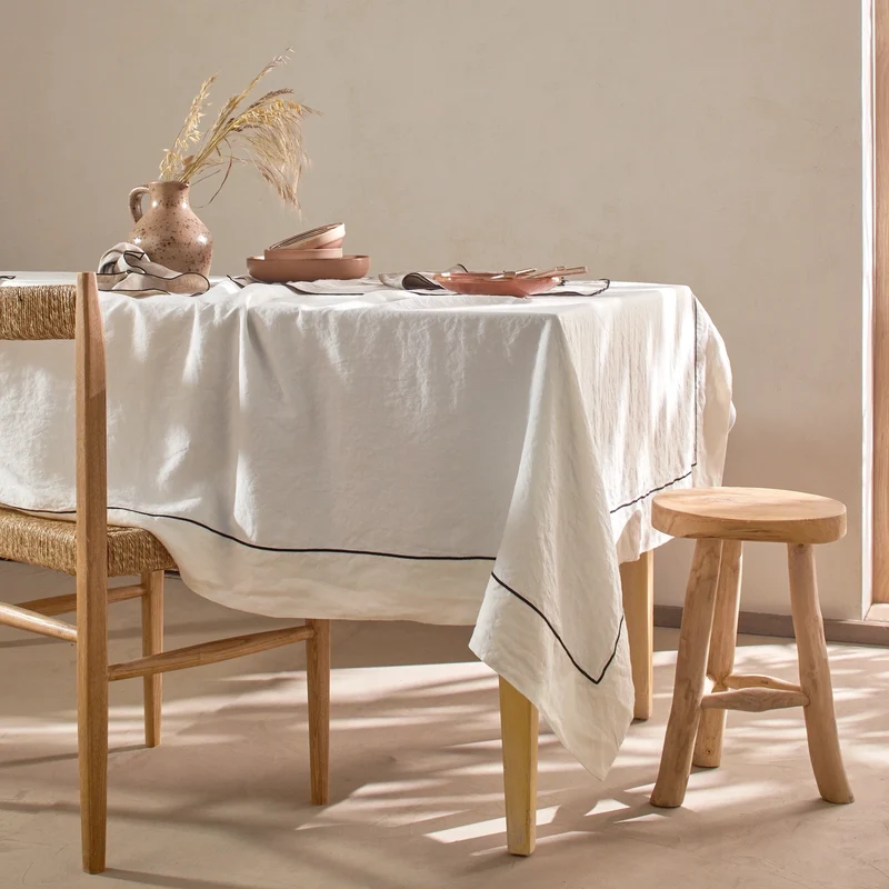 Mantel rectangular con borde bourdon de lino lavado marfil