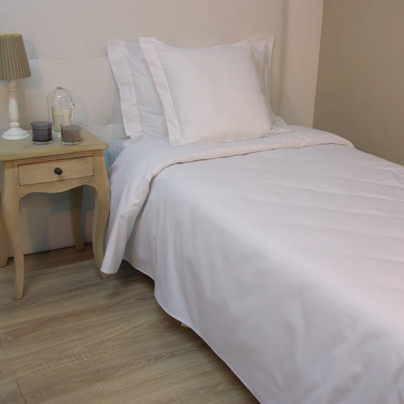 Colcha jacquard rombo blanca