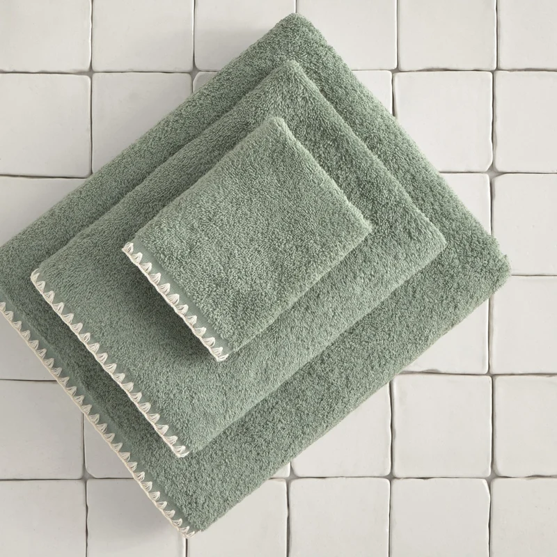 Toalla baño rizo algodón pespunte Unimax