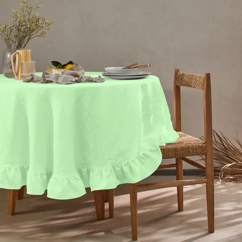 Mantel redondo con volantes en lino lavado verde menta
