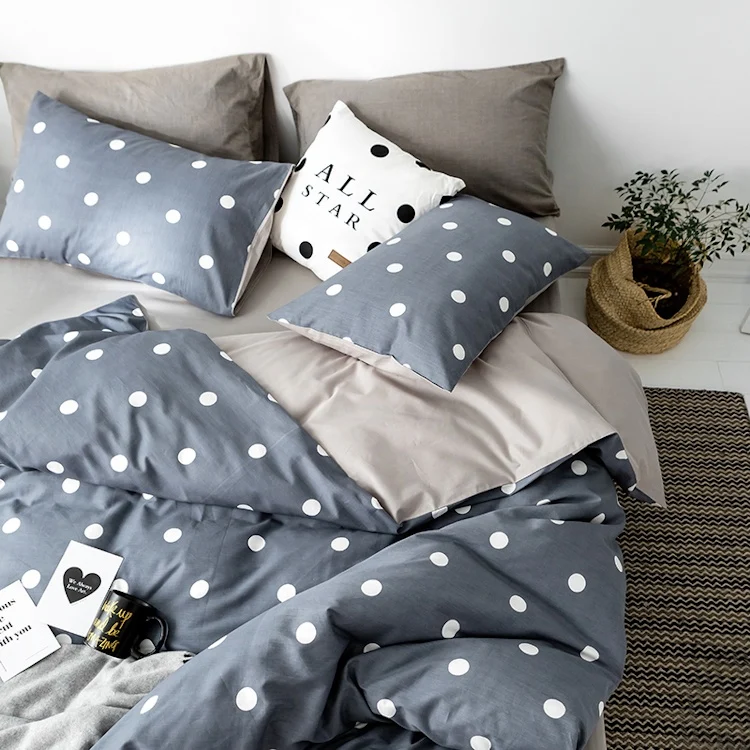 Funda de almohada con estampado de topos, reversible.