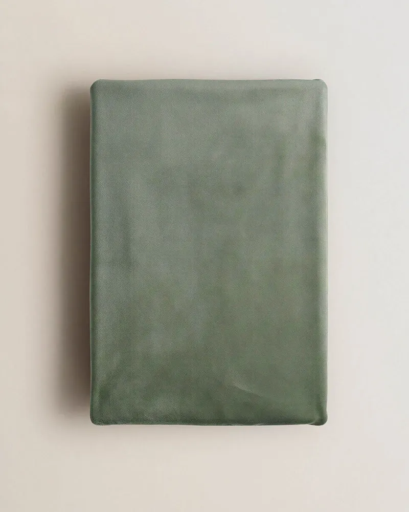 Funda de sofá lisa verde seco