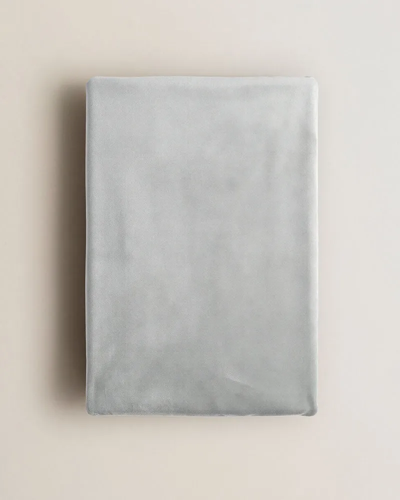 Funda de sofá lisa gris claro